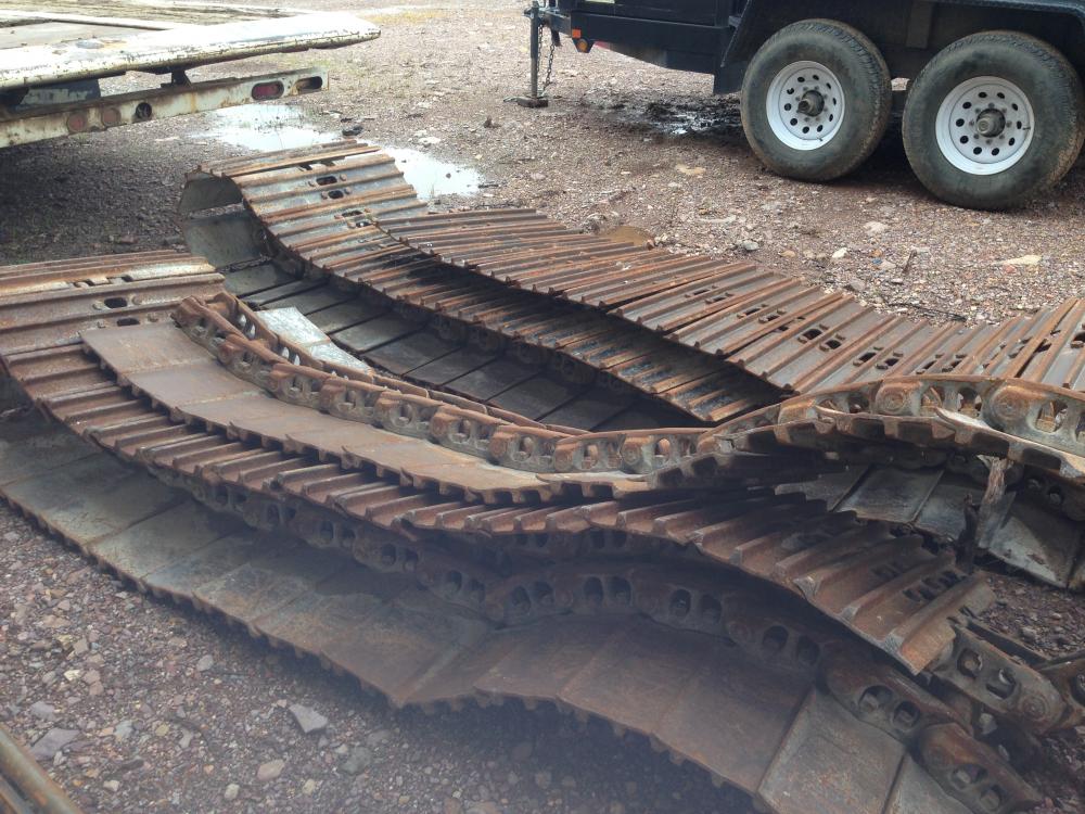 CADENAS  Y ZAPATAS PARA EXCAVADORA