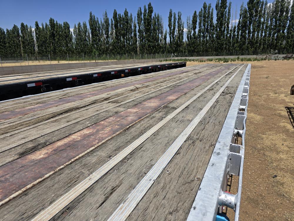 REMOLQUE TIPO PLANA CAMA ALTA