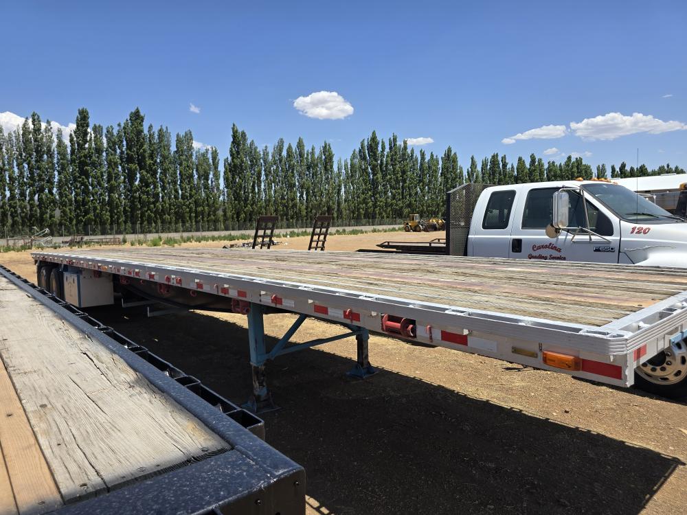 REMOLQUE TIPO PLANA CAMA ALTA