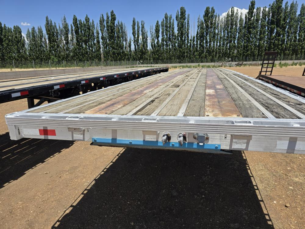 REMOLQUE TIPO PLANA CAMA ALTA