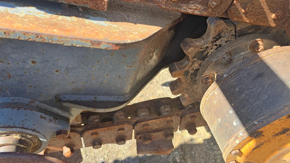 ZANJADORA CON BRAZO EXCAVADOR