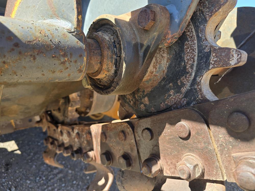 ZANJADORA CON BRAZO EXCAVADOR