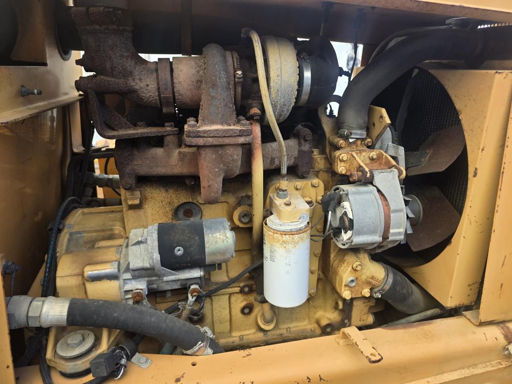 ZANJADORA CON BRAZO EXCAVADOR