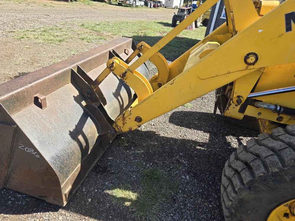 CARGADOR CON NIVELADORA